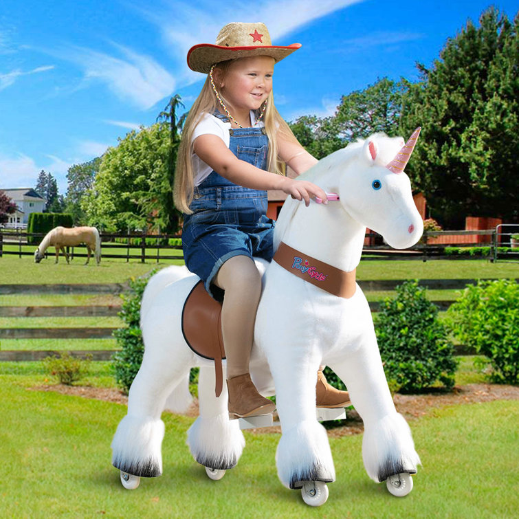 Unicorn riding cheap horse toy